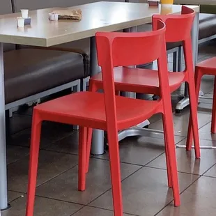 red chairs and tables in a restaurant