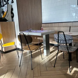 a table and chairs in a restaurant