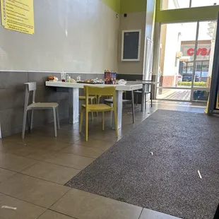 Dirty place... common sense people clean your mess the trash can is 5 feet away! No employee around either to clean up area.