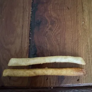 90% of my fries were burnt and inedible. Only a few normal fries were in the batch. I set them next to each other to show the difference.