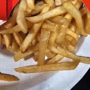 Greasy hard french fries.