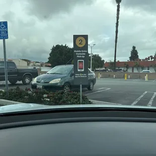 a parking lot with cars parked in it