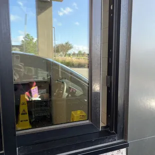 the reflection of a car in the window