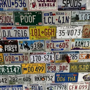 a wall of license plates