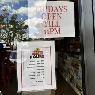a closed sign in the window of a restaurant