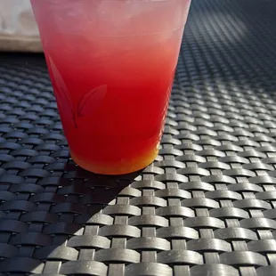 Drink of the day rum with pineapple juice and cranberry juice $6