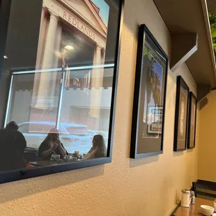 people sitting at a table in a restaurant