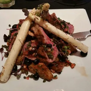 Rack of lamb with blueberries and asparagus