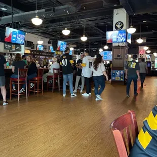 Bar area, large open room, tvs everywhere.