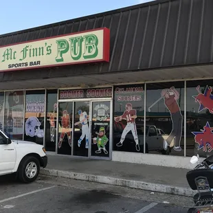 a motorcycle parked in front of the store