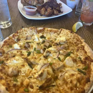 Thai chicken flatbread, gluten free (so no wontons).  Croissant breakfast sandwich. Bloody Mary