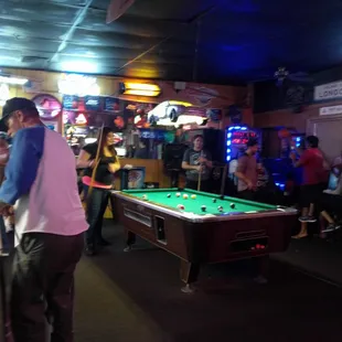 a man playing pool