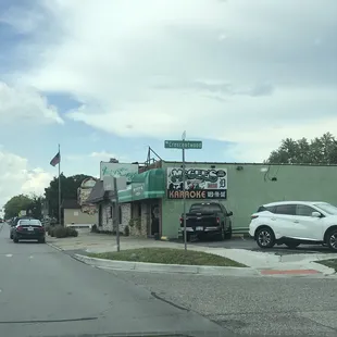cars parked in front of the restaurant