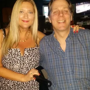 a man and a woman posing for a picture