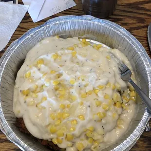 Top Hand, breaded chicken fry steak w/mashed potatoes, w/white gravy, corn on top. I got 3 meals out of this. I enjoyed it. Very filling!