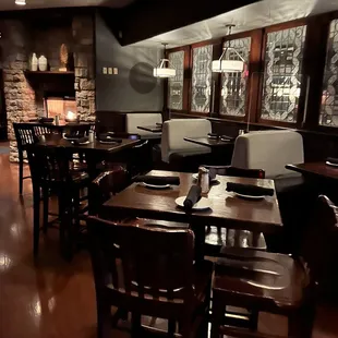 a restaurant with tables and chairs