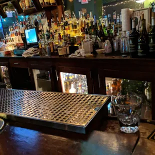 a bar with a lot of bottles