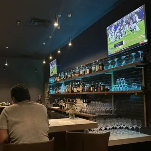 a man sitting at a bar