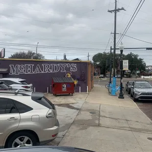  cars parked on the side of the road