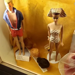 Vintage Ken and Barbie dolls inside the McHenry Museum.