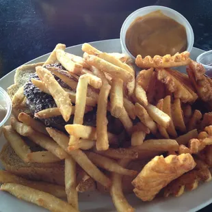 There is a Guinness beer-cheeseburger buried under the fries