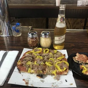 Small deluxe with the green peppers swapped out for sweet banana peppers washed down with ice cold miller highlife.