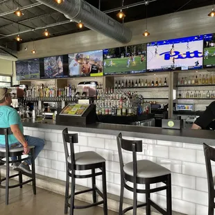 a man sitting at the bar