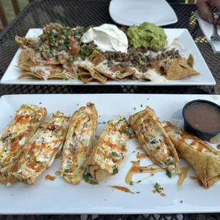 Steak nachos and Papa's Poppers