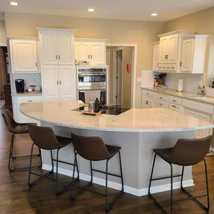 Kitchen Upgrade with new stone countertops, backsplash tile and laminate flooring! See more pictures in our Portfolio!