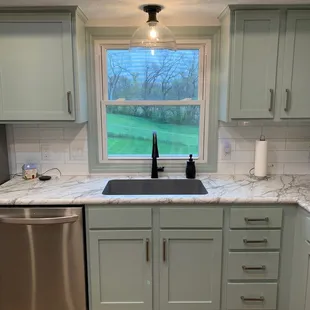 Kitchen Remodel including new cabinets, countertops, backsplash and floors! See more pictures in our Portfolio!