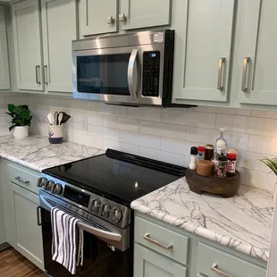 Kitchen Remodel including new cabinets, countertops, backsplash and floors! See more pictures in our Portfolio!