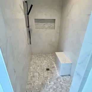 Shower floor and wall tile by McKean's