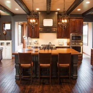 New Home Construction - Hardwood floor and tile backsplash by McKean's