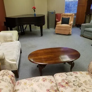 A piano &amp; lounge area upstairs