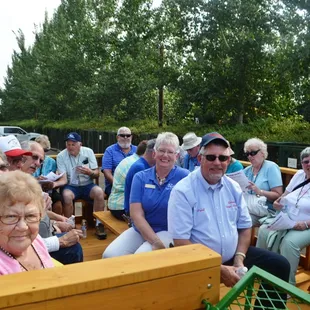 A recent tour group taking a ride on our tractor 'hayride'