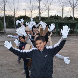Kids love picking oranges during their tour!
