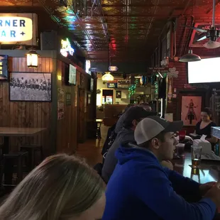 people sitting at the bar