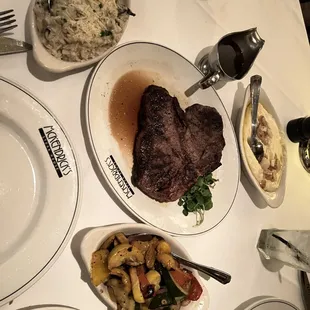 Steak with our sides of mushroom risotto, garlic mashed potatoes and grilled assorted vegetables