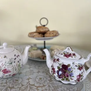 two teapots on a table