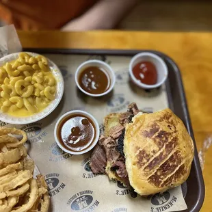 Sandwhich plate $12.99 $1 Jalapeño Sourdough Bun $1 onion rings  $2.18 Mac &amp; cheese