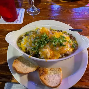 a bowl of soup and bread