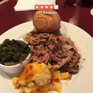 Large Pulled Pork with Mac and Cheese and Collard Greens. $13.99