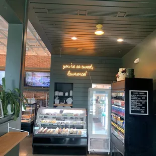 Entry way. Love the neon sign