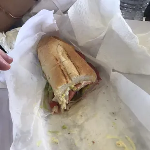 a sub sandwich in a wrapper