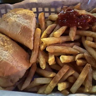 Pulled pork sandwich with fries