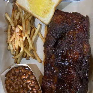 Ribs! Beans! Yum! Great flavor and meat falls off the bones!