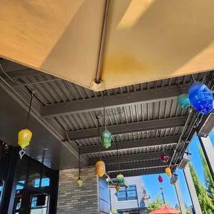 Colorful overhead lighting.