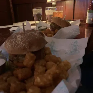 Burgers and Cajun tots.