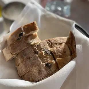 Bread service (half olive bread, half seed/grain)