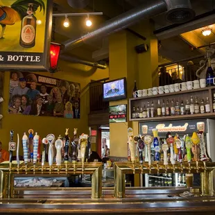 a bar with beer taps